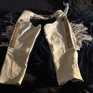 White Leather Chaps with Fringe w bone accents.